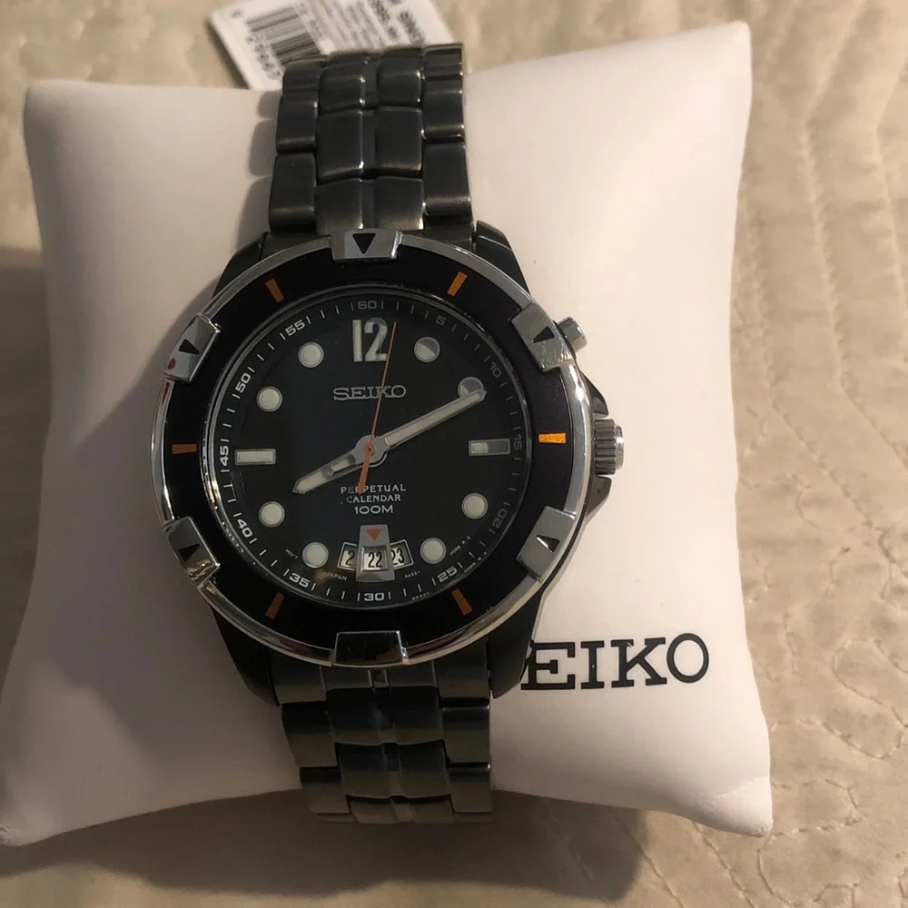 Seiko Black Dial Stainless Steel Watch with Orange Accents